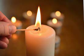 Lighting A Candle For Someone Mean
